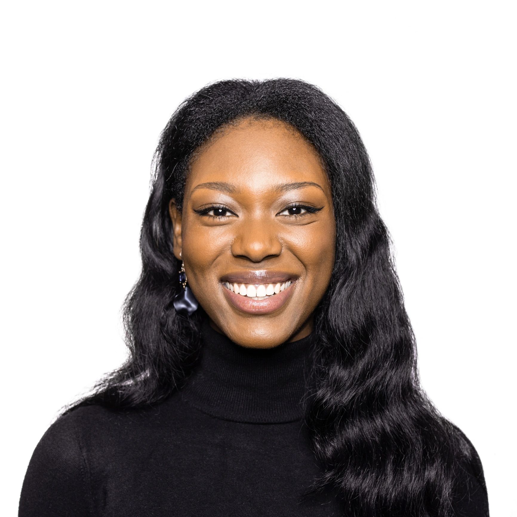 Headshot of a smiling fitness coach