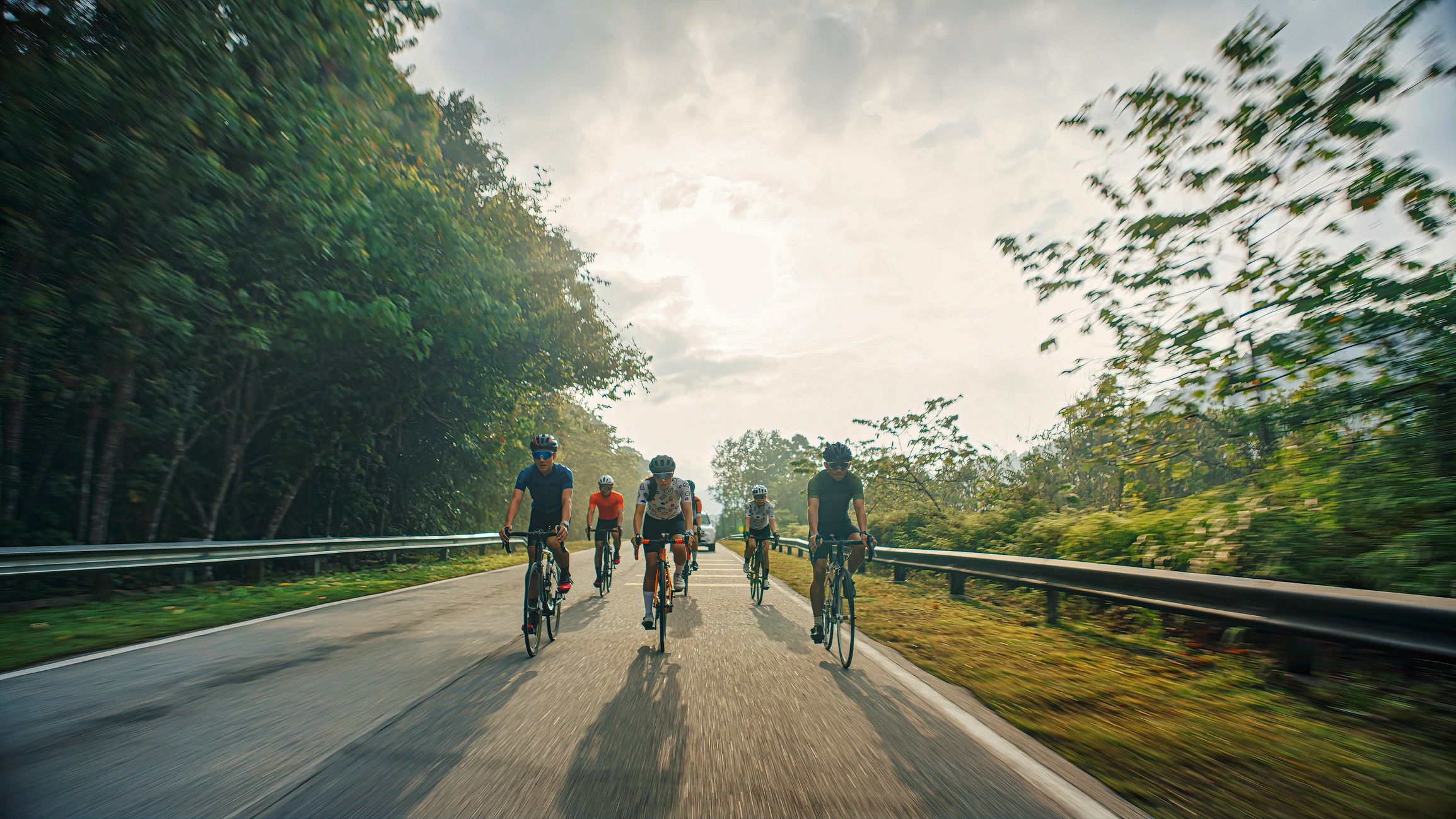 Cyclists riding in a spin-style workout