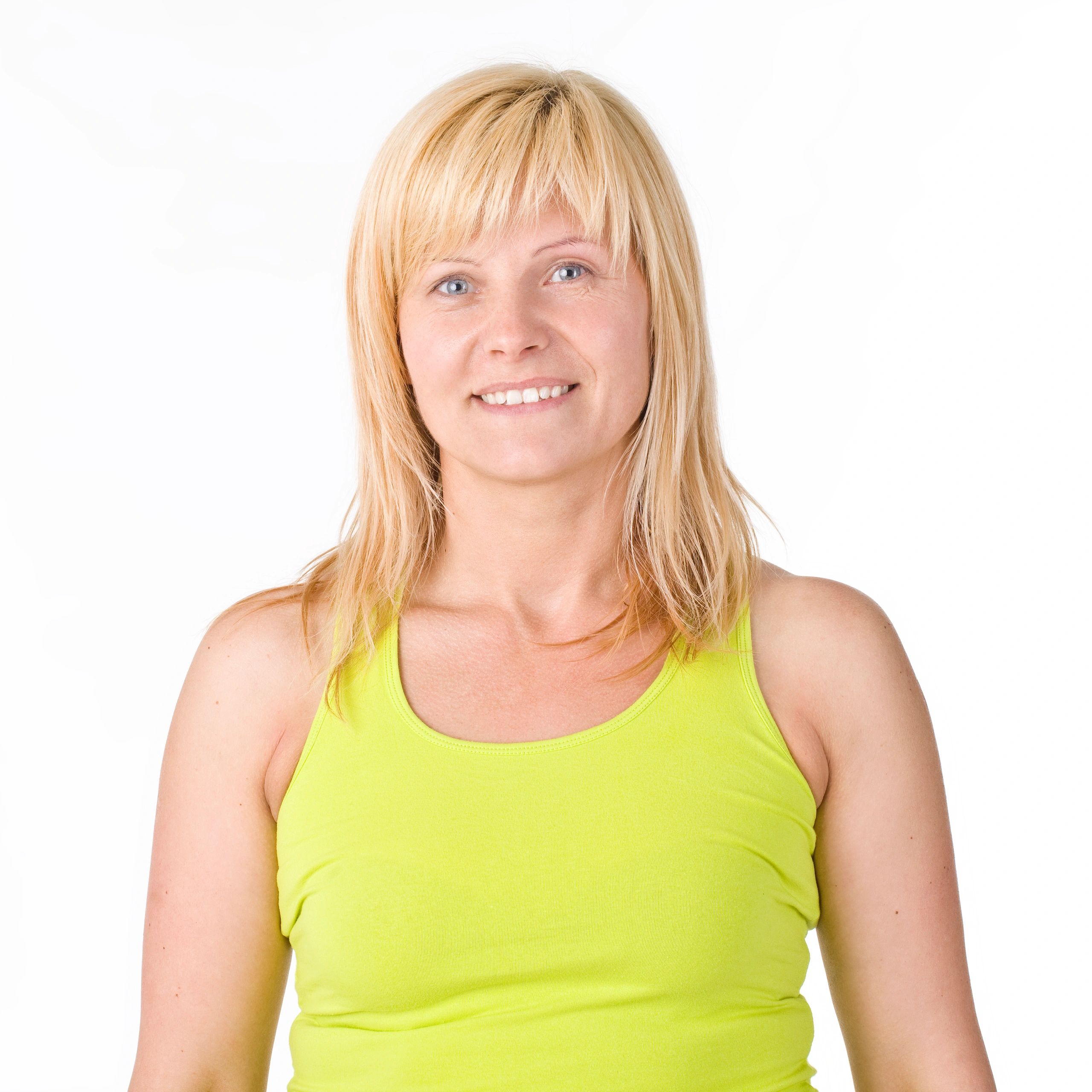 Headshot of a smiling spin coach
