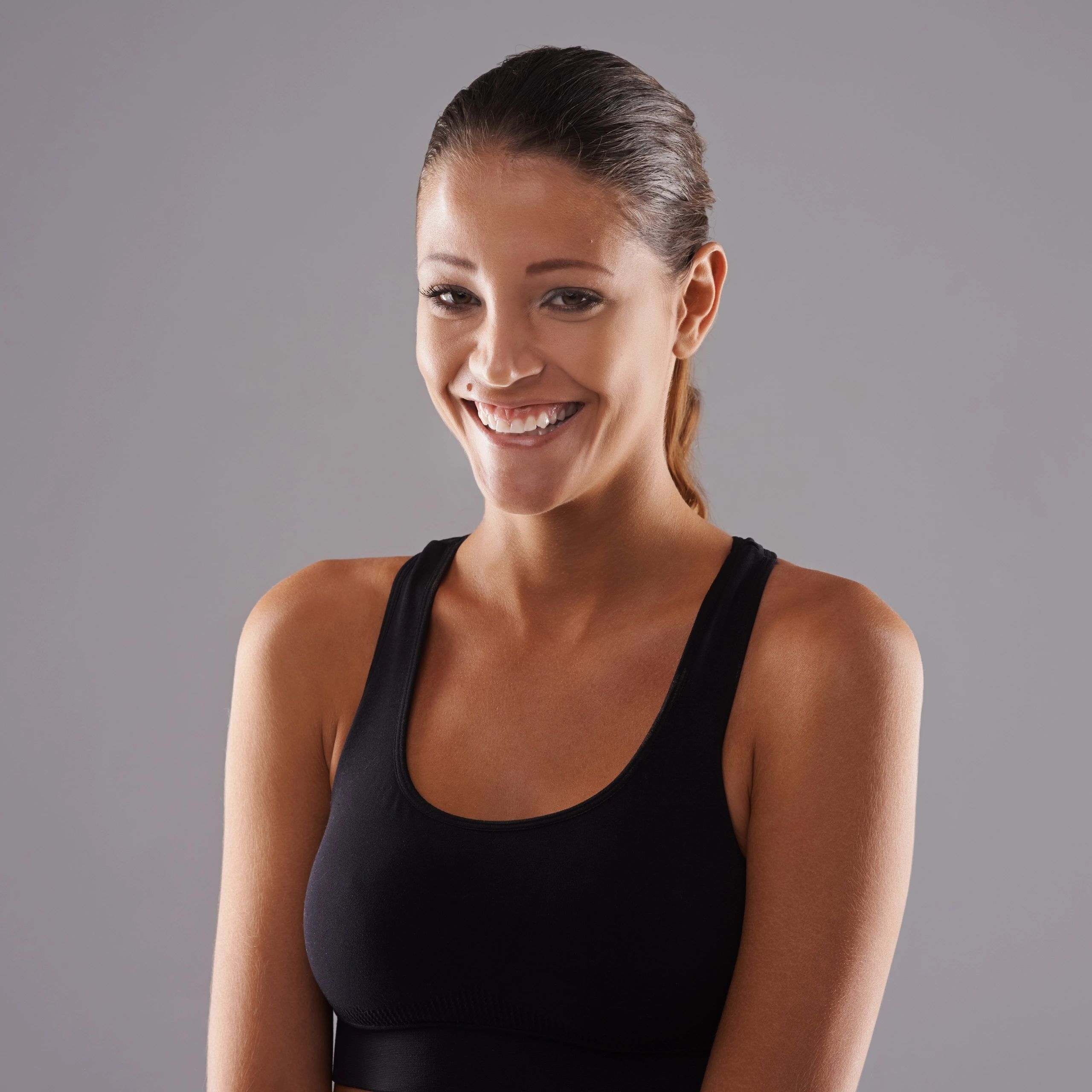 Portrait of a smiling fitness studio member